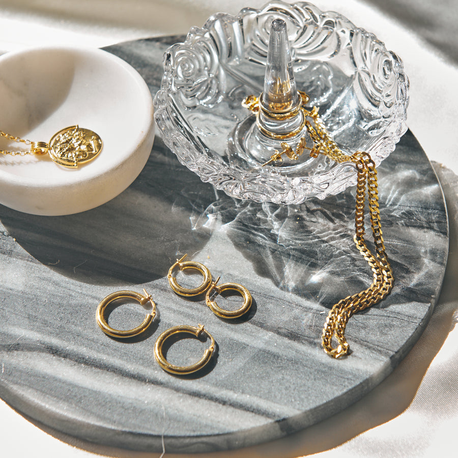 gold vermeil jewellery flat lay product still
